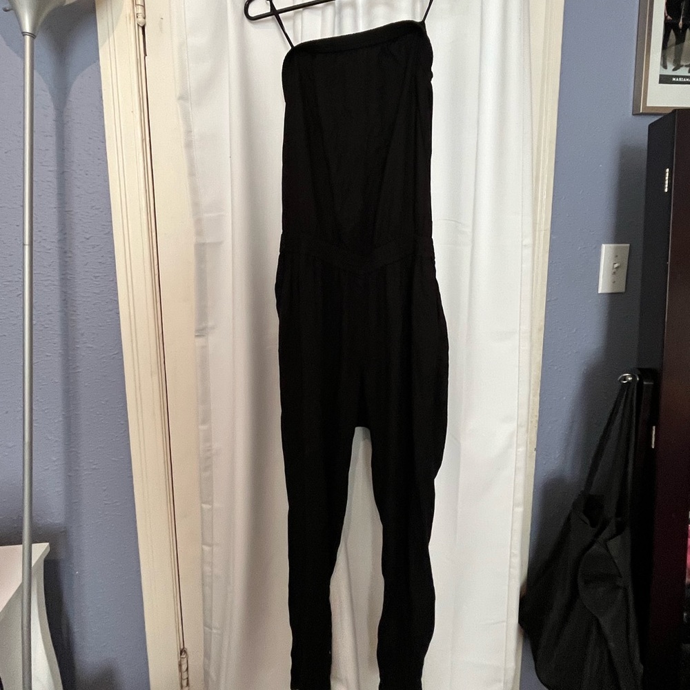 Strapless black jumpsuit with pockets